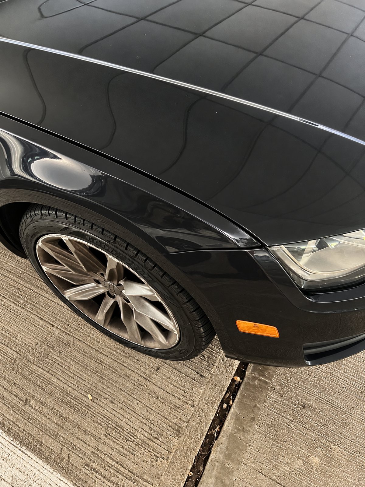 The same Audi fender, straightened and repainted